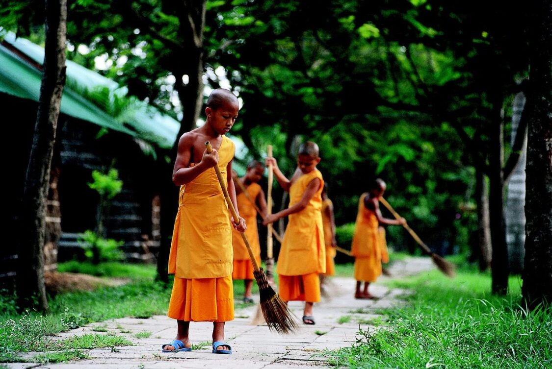 Young Thai Monks Sweeping