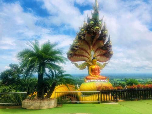 Sakon Nakhon Buddha with Naga