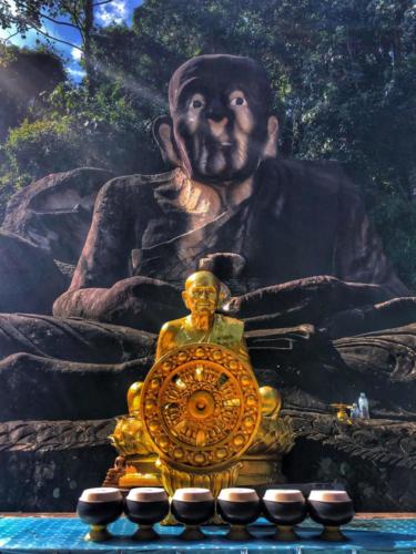 Wat Tham Pha Daen Luang Pu Thuat Stone Statue