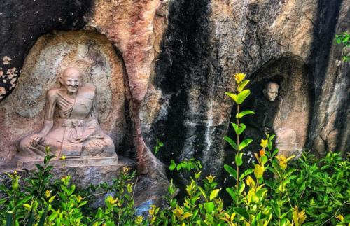Wat Tham Pha Daen Monk Cliff