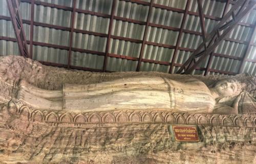 Wat Tham Pha Daen Reclining Buddha Stone